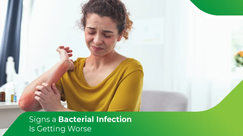 Woman scratching a red, inflamed arm due to worsening bacterial infection